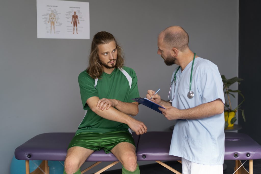 An athlete consulting a physiotherapist for injury prevention and personalized care to maintain an active lifestyle.